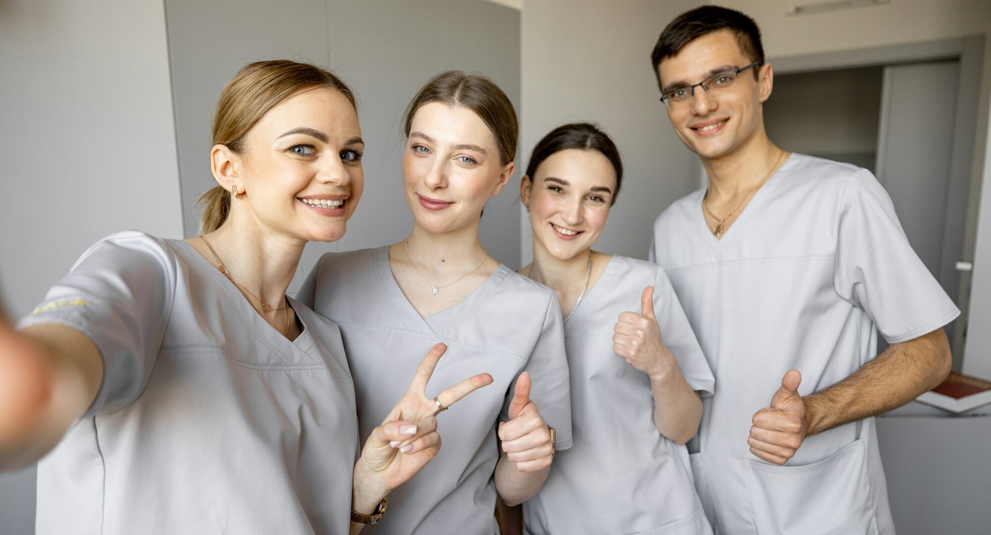 Young team of nurses making selfie photo